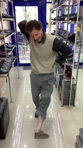 Shoe Shopping Experience: Trying on Stylish Footwear