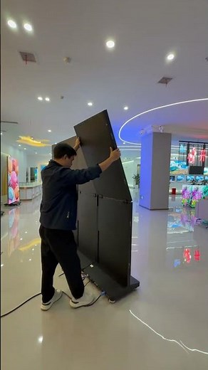 Watch multiple foldabel LED display come together to form one seamless large screen