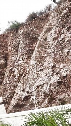 Rainfall pours down in Mesa