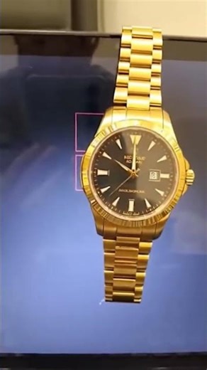 gold luxury watch hanging on laptop windows 11 kill screen