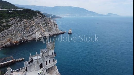 Crimea Swallow's Nest Castle on the rock over the Black Sea. It is a tourist attraction of Crimea. Amazing aerial view of the Crimea coast with fairytale castle above abyss.
