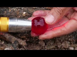 Red crystals are formed in volcanic caves by the sea. Gems, diamonds