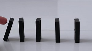 Dominoes Falling Row Hand Pushes Domino Stock Footage Video (100% Royalty-free) 1069779142 | Shutterstock