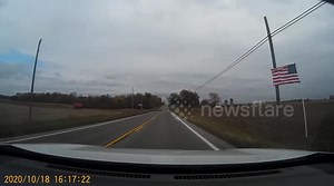 'This is Trump Country': A SIX-mile stretch lined with Trump 2020 flags