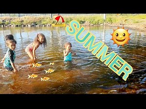 Kids enjoy Playing on the beach .Fun swimming during summer
