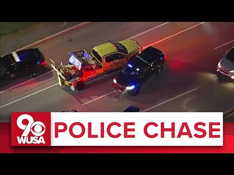 POLICE CHASE COVERAGE: Stolen tow truck plows through police and civilian cars in Maryland