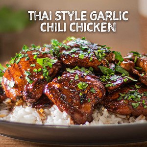 Thai Style Garlic Chili Chicken, beautifully glazed, garlic, charred chicken thighs! 👉 Get this written recipe link here: www.recipe30.com/thai-style-garlic-chili-chicken.html/ Beautifully glazed, garlic, charred chicken thighs, with a hit of heat! You may call this fusion food as it’s not traditionally Thai, as it has a western twist to it. The chicken is first marinated overnight in a mixture of sauces and spices, it’s then grilled and coated in the marinade glaze. It’s simple to make, one bo