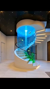 Exploring dreams and modeling dream homes 😍 a luxurious living room with aquarium #home #construction #homedecor #gardening #architecturaldesign | Accra Real Estate