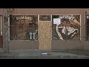 Denver tailor shop owner reels from fire