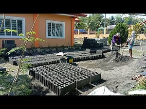 Manual making of concrete hollow blocks in the Philippines
