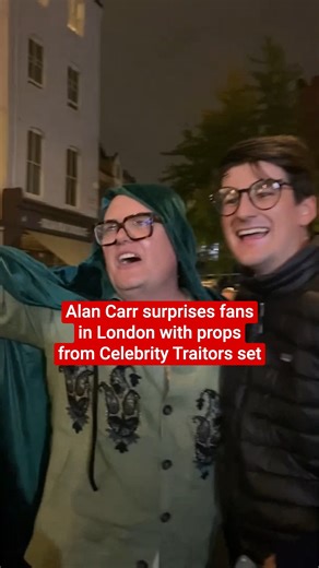 Alan Carr surprises fans in London with props from Celebrity Traitors set | The Independent