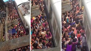 If you think your commute was bad this morning, spare a thought for these Indian commuters - pictured trying to climb over each other in the desperate rush to get on an overcrowded train. | Storytrender