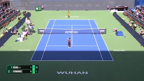 Osaka rallies to beat Fernandez in Wuhan