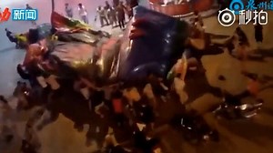 Horrifying moment bouncy castle is flipped over by high winds