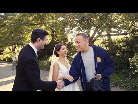 Watch This Couple's Shocked Reaction When Tom Hanks Crashes Their Wedding Photos