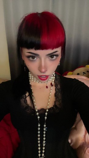 Stylish Outfit Showcase with Black and Red Hair