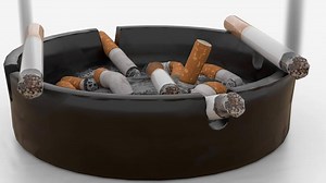 burning cigarette on ashtray