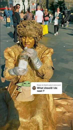 Water for Golden woman statue #goldlady #busker
