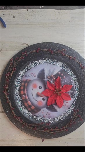 Just a Dollar Tree plate, a snowman, and a little creativity...turned simple supplies into Christmas cheer, one craft at a time #ChristmasCrafting #Christmas | Crafty Basket Case