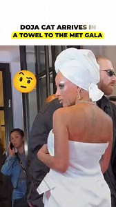 1.6M views · 14K reactions | Doja Cat arrived undressed and covered by a towel as silver tears ran down her cheeks to the red carpet. An unexpected look that caused controversy | Icons + | Facebook