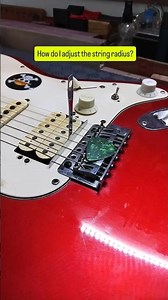 How do I adjust the string radius?#guitarworkshop #guitarsetup #luthier #guitarra #guitarrepair