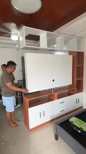 Partition cabinet with rotating TV panel to entertain you on both sides #tvcabinet #RotatingTV #interiordesigner #FurnitureDesign #interiordecorating #interiordesign #homedesign #creativedesign #tvrack #HomeImprovement | Creative Design