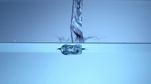 Download Water surface splash in slow motion for free