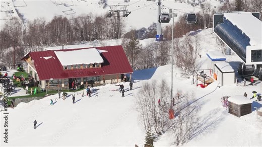 Mestia, Georgia - 15th january, 2026: Hatsvali ski resort top station in Mestia, Georgia. Aerial view snowy forest and mountains, bright winter day, ski lift station visible in remote Caucasus region