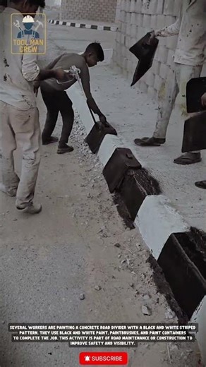 Efficient Concrete Road Divider Painting: Black & White Striping Process