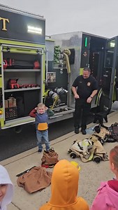 This young man raced his KFD Fire Captain father to demonstrate our gear at John Adams Elementary. | Kingsport Fire Department