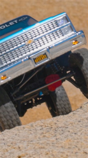 10K views · 170 reactions | Every detail dialed.  The SCX10 III Pro-Line 1982 Chevy K10 delivers serious scale with a factory-painted body, molded grille, bumpers, mirrors, and working brake lights. Underneath, it’s loaded with Pro-Line upgrades like Hyrax G8 tires, Rock Shooter wheels, and Big Bore Scaler shocks for peak performance on the trail. #Axial #ProLine #SCX10 #RCcrawler | Axial Adventure | Facebook