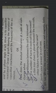 emf by a phase angle of \pi / 2. What is its capacitive reactan... | Filo