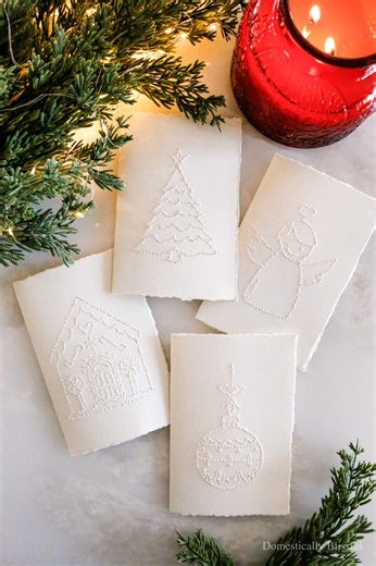 These DIY Pinpoint Embossed Christmas Cards are a super easy way to create beautiful Christmas cards this holiday season with my free printables! | Domestically Blissful