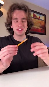 What he does to make the pencil appear invisible?