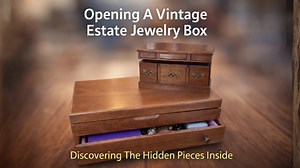 Opening a vintage estate jewelry box discovering the hidden pieces inside