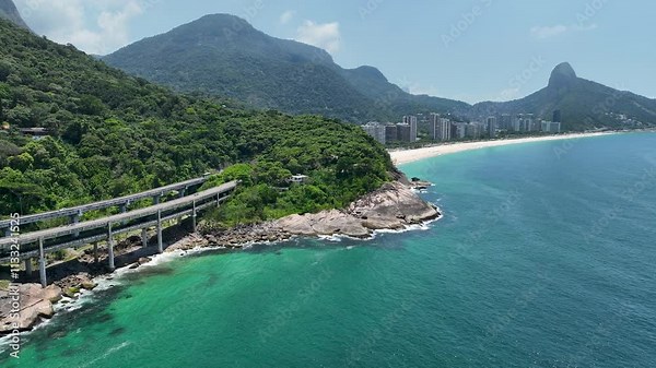 Rio De Janeiro Skyline At Barra Da Tijuca Rio De Janeiro Brazil. Powerful Landscape Of The Vehicles In A Famous Road . Shore Clouds Sky Beach Sea. Shore Seaside Scenic Coastline. Stock Video
