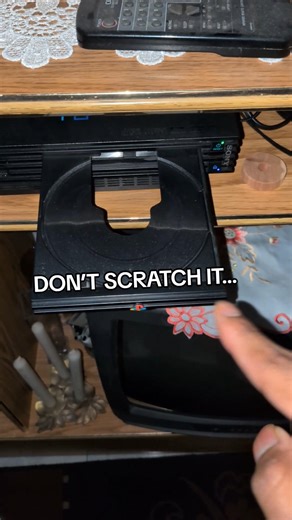 How To Insert A PS2 Disc (Don’t Scratch It)
