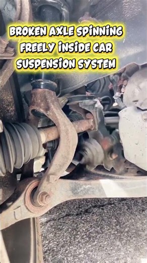 Broken Axle Spinning Freely Inside Car Suspension System