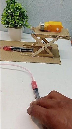 Hydraulic lift system project//hydraulic working model//#trending#shortvideo#project