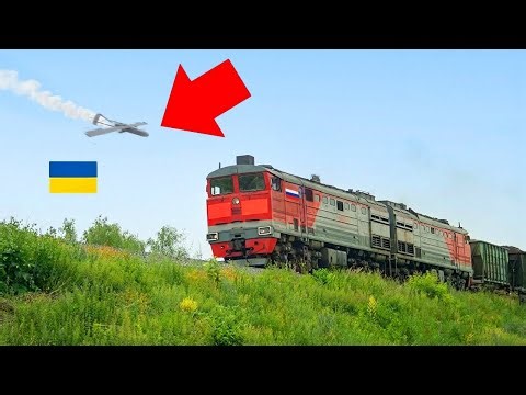 Watch Ukrainian Drones DESTROY a Russian Train