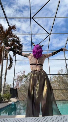 Umbreon cosplay, wings on display, sunny day?