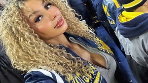 Modelo de Onlyfans le copia a Ashley Carolina tras la victoria de los Michigan Wolverines