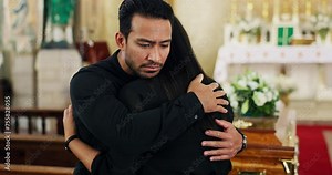 Church, family and sad at funeral with hug for mourning or grief, depression and support for death or mental health. People, together and ceremony or memorial for loss with comfort and unhappy sorrow