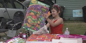 Community car parade celebrates 9-year-old battling leukemia