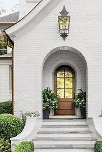 Gorgeous White Homes   White Exterior Paint Colors to Try Now! - Hello Lovely