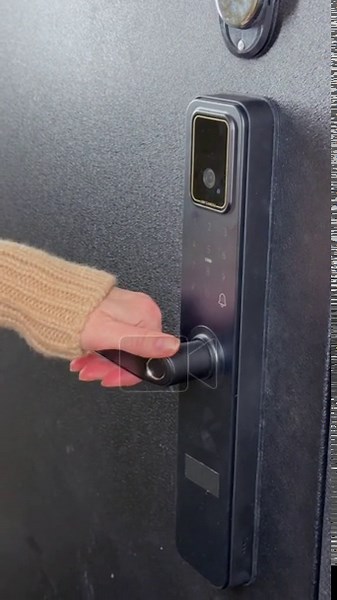 A woman opens a modern smart door lock with a digital keypad using a code Stock Video Footage - Alamy