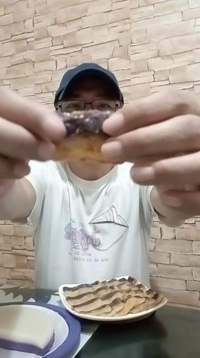 Homemade Tikoy (2 flavours in 1) 2 1/4 c water 1 c sugar 2 1/2 c glutinous rice flour Ube Tikoy Add: 1 tsp ube flavour 1/4 tsp violet colour (or more) 1/4 c ube halaya (optional) Flavor Variations: ube, cheese, brown sugar, pandan, chocolate, milk Dissolve sugar in water. Add the glutinous rice flour. Oil the round pan. Pour the mixture in the pan. Cover the pan with aluminium foil. Steam for 40-50 mins or until firm. Cool down to room temperature before removing from the mold. Wrap in plastic c