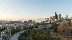 Ultra high definition 4k time lapse movie of sky and moving peak hour auto traffic on interstate 5 freeway with downtown city skyline in Seattle Washington 4k uhd 3840x2160