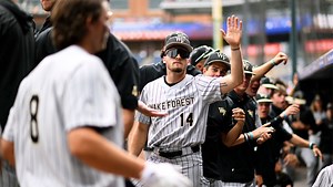 Wake Forest BSB Player Thrusts In Teammate's Face To Celebrate Win