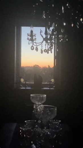 ✨Autumn Sunset glistening on the chandeliers ✨#sunset #chandelier #sparkle #crystals #windowscape